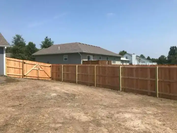 Fresh cedar privacy fence with gate